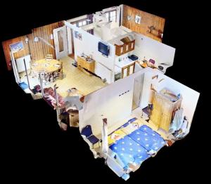 una vista aérea de una sala de estar y una casa en CASA-Le Toussiard apartment in chalet St-Véran 4-6p 