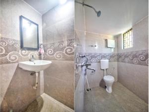 La salle de bains est pourvue d'un lavabo et de toilettes. dans l'établissement Calangute Sea Steps, à Calangute