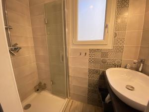 Et badeværelse på Maison de vacances en front de mer