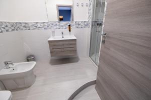 Kúpeľňa v ubytovaní Room 112 Oltremare