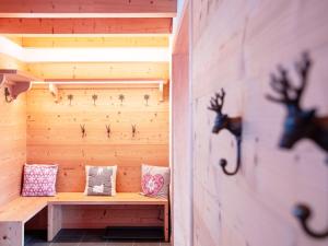 a sauna with a bench in a wooden room at Chalet Chalet les Pars by Interhome in Gryon