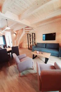 Istumisnurk majutusasutuses Holiday Home Alpenchalets Nassfeld-Rattendorf-3 by Interhome