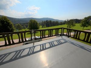 a view of the mountains from the balcony of a house at Holiday Home Hoja by Interhome in Vítkovice