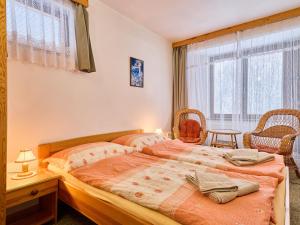 a bedroom with two beds and a window at Villa Villa Jana by Interhome in Svoboda nad Úpou