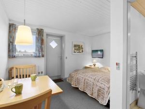 Un pat sau paturi într-o cameră la Holiday Home Annli - 800m to the inlet in The Liim Fiord by Interhome