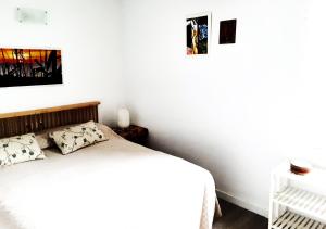 Postel nebo postele na pokoji v ubytování Villa Lunas
