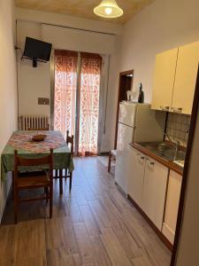 Kuchyň nebo kuchyňský kout v ubytování Hotel Wega