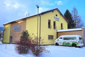 Apartmány U stezek v zimě