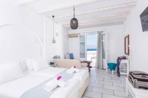 Krevet ili kreveti u jedinici u okviru objekta Cycladic Islands Hotel & Spa