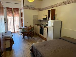 Kuchyň nebo kuchyňský kout v ubytování Hotel Wega