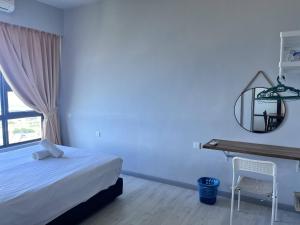 Splendours Condos@Jesselton Quay房間的床