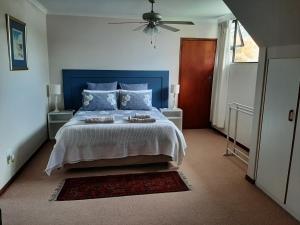 Ένα ή περισσότερα κρεβάτια σε δωμάτιο στο Leisure Island Apartment