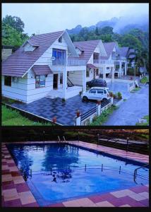 בריכת השחייה שנמצאת ב-Dream Nest Villas Athirappilly או באזור