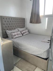 Voodi või voodid majutusasutuse Appartement- Terrasse sublime toas