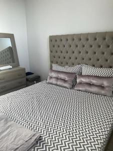 Voodi või voodid majutusasutuse Appartement- Terrasse sublime toas