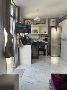 Köök või kööginurk majutusasutuses Appartement- Terrasse sublime