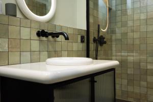 Koupelna v ubytování La Villa Serra - Appartements + 32 fotografií
