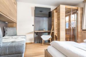 Łóżko lub łóżka w pokoju w obiekcie Appartement Arnoldgut
