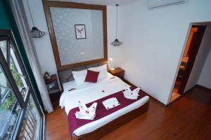 Letto o letti in una camera di NT Elysian hotel