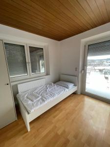 Postel nebo postele na pokoji v ubytování Ferien- und Monteurswohnung in Amstetten + 6 fotografií