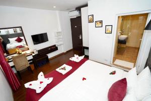 Letto o letti in una camera di NT Elysian hotel