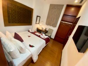 Letto o letti in una camera di NT Elysian hotel