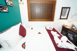 Letto o letti in una camera di NT Elysian hotel