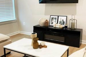 a living room with a coffee table and a couch at New 3BR condo near IAD airport weekly and monthly discount in Herndon