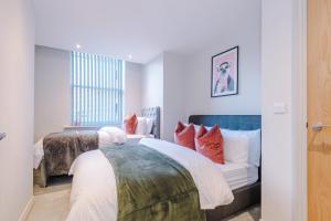 Postelja oz. postelje v sobi nastanitve Gorgeous Flat in Central Leeds by PureStay Short Stays