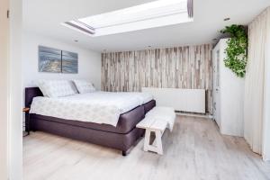 Ein Bett oder Betten in einem Zimmer der Unterkunft Appartement / Bed en Breakfast Kaatsheuvel