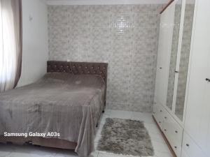 Ένα ή περισσότερα κρεβάτια σε δωμάτιο στο Casa de fácil acesso 1a2km da prai