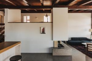 a living room with a couch and a table at Haus A Ankommen-Abschalten-Auftanken in Bregenz