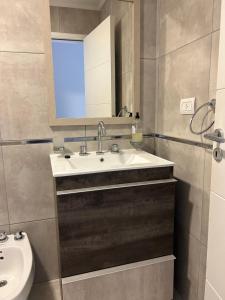 Koupelna v ubytování Bonjour alquiler temporario 2 + 11 fotografií