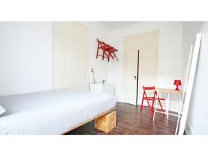 A bed or beds in a room at Friendly Hills Bairro Alto
