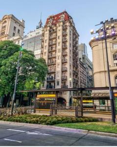 a large building in the middle of a city at La Platea de Bs As [2A1] Live by the CCK. in Buenos Aires
