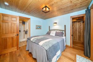 Ένα ή περισσότερα κρεβάτια σε δωμάτιο στο Blue Heaven MCA#812