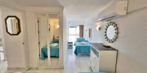 A bed or beds in a room at Skol 706 Lovely 2 Bedroom Apartment For Rent in Skol Marbella