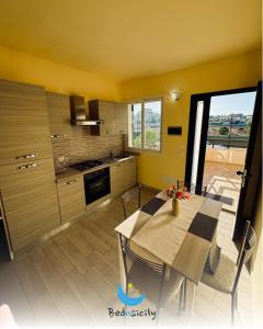 Kuchyň nebo kuchyňský kout v ubytování Casa Mimosa Marzamemi