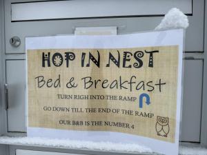 Um certificado, prémio, placa ou documento mostrado em Bed & Breakfast in car-free Wengen - Hop in Nest BnB