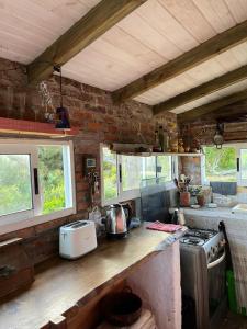 Kuchyň nebo kuchyňský kout v ubytování La Peregrina - Posada