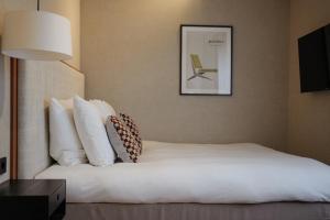 Postel nebo postele na pokoji v ubytování By Friso Den Haag - Scheveningen + 79 fotografií