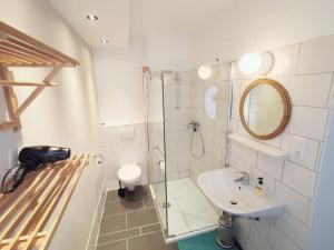 A bathroom at DMG - 'Funky First Floor' Unique Mountain Apartment
