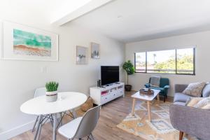 a living room with a couch and a table at Redondo Beach 1br nr water restaurants shops LAX-1170 in Redondo Beach