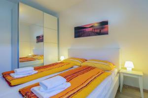 Posteľ alebo postele v izbe v ubytovaní Villa Stefanja kids friendly with sea view near Fažana