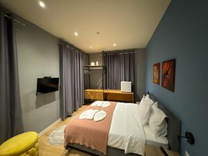 Postel nebo postele na pokoji v ubytování Hotel Tirona