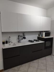 Η κουζίνα ή μικρή κουζίνα στο Appartamento Rozzano