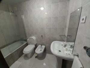 Um banheiro em Hotel Dom Joao IV