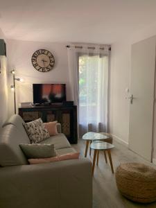 Χώρος καθιστικού στο La Villa du Port - Cosy - Clim - proche plage - 4 personnes