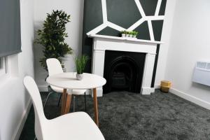Zona de estar de Credit Corner