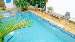 Bazén v ubytování Hotel Le Falep & Spa nebo v jeho okolí